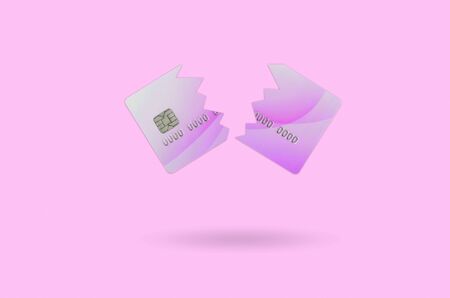 Cut and broken purple credit card floating in the pastel pink space. The concept of ban to use banking services. Credit card expire end soonの写真素材