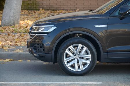 KHARKOV, UKRAINE - OCTOBER 21, 2019: Volkswagen car wheel. Volkswagen Group is a German automobile manufacturing group based in Wolfsburg, Germany, and founded in 1937のeditorial素材