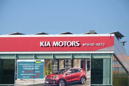 KHARKOV, UKRAINE - OCTOBER 20, 2019: Kia Automobile shop Dealership car logo Store sign. Kia Motors is South Korea's automobile manufacturerのeditorial素材
