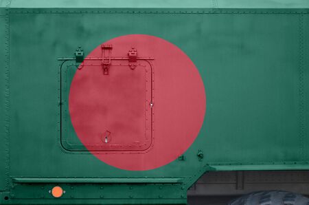 Bangladesh flag depicted on side part of military armored truck close up. Army forces vehicle conceptual backgroundの写真素材