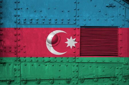 Azerbaijan flag depicted on side part of military armored tank close up. Army forces conceptual backgroundの写真素材