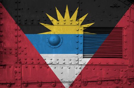 Antigua and Barbuda flag depicted on side part of military armored tank close up. Army forces conceptual backgroundの写真素材