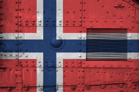 Norway flag depicted on side part of military armored tank close up. Army forces conceptual backgroundの写真素材