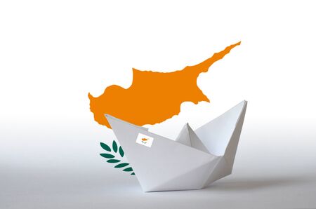 Cyprus flag depicted on paper origami ship closeup. Oriental handmade arts conceptの写真素材