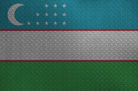 Uzbekistan flag depicted in paint colors on old brushed metal plate or wall close up. Textured banner on rough backgroundの写真素材