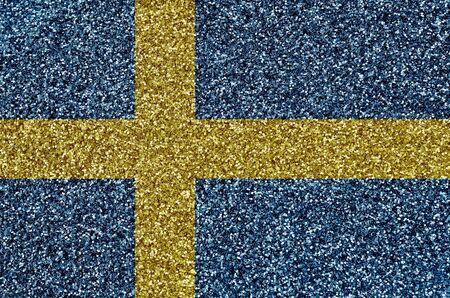 Sweden flag depicted on many small shiny sequins. Colorful festival background for disco partyの写真素材