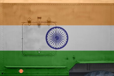 India flag depicted on side part of military armored truck close up. Army forces vehicle conceptual backgroundの写真素材