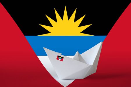 Antigua and Barbuda flag depicted on paper origami ship closeup. Oriental handmade arts conceptの写真素材