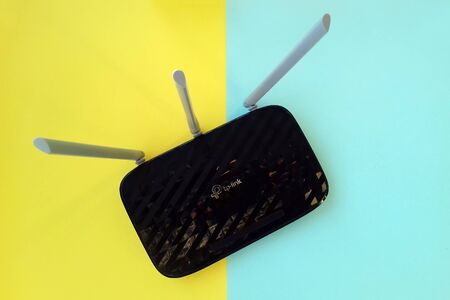 NY, USA - NOVEMBER 24, 2019: New tp-link logo on wireless router modem tp link Archer C20 AC750...