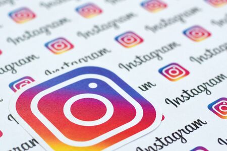 NY, USA - DECEMBER 5, 2019: Instagram pattern printed on paper with small instagram logos and inscriptions. Instagram is American photo and video-sharing social networking service owned by Facebookのeditorial素材