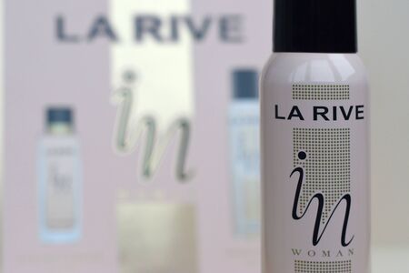NY, USA - DECEMBER 29, 2019: La rive IN woman deodorant and perfume bottles on prefume box background. LA RIVE S.A. is one of the leading producers of perfumes and perfumed waters in Europeのeditorial素材