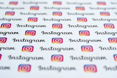 NY, USA - DECEMBER 5, 2019: Instagram pattern printed on paper with small instagram logos and inscriptions. Instagram is American photo and video-sharing social networking service owned by Facebookのeditorial素材