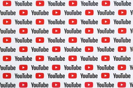 NY, USA - DECEMBER 5, 2019: Youtube pattern printed on paper with small youtube logos and...