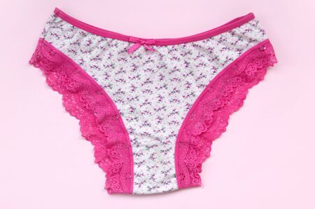 White women underwear with lace on pink background close up with copy space. Beauty fashion blogger...