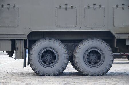 Close up view of green military truck. Modern military transportation vehicle technologies