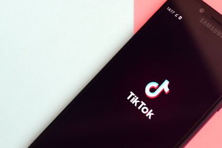 KHARKOV, UKRAINE - FEBRUARY 16, 2020: Tiktok application on samsung smartphone screen on pastel...