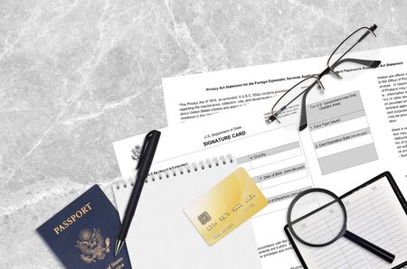 Department of State form DS4139 Signature card lies on table and ready to fill. Paperwork during operations with US Passport concept. Flat lay top viewの写真素材