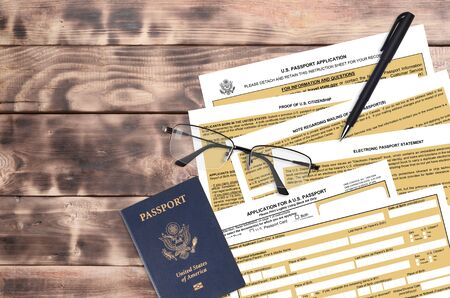 Department of State form DS11 Application for a U.S. Passport lies on table and ready to fill....