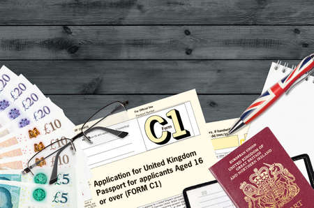 English form C1 Application for United Kingdom passport for applicants aged 16 or over lies on table...