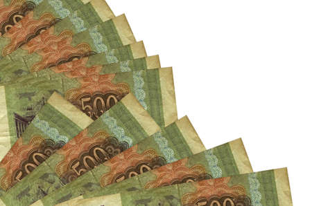 500 russian rubles bills lies isolated on white background with copy space stacked in fan close up....