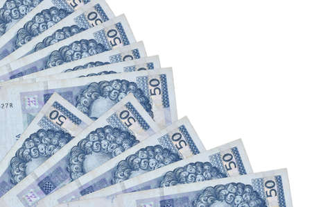 50 Croatian kuna bills lies isolated on white background with copy space stacked in fan close up. Payday time concept or financial operationsの写真素材