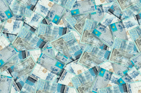 500 Kazakhstani tenge bills lies in big pile. Rich life conceptual background. Big amount of moneyの写真素材