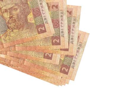 2 Ukrainian hryvnias bills lies in small bunch or pack isolated on white. Mockup with copy space....