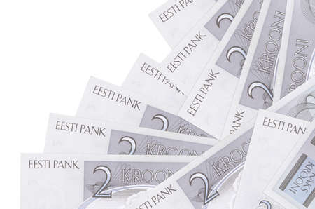 2 Estonian kroon bills lies in different order isolated on white. Local banking or money making...
