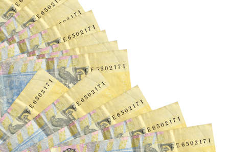 1 Ukrainian hryvnia bills lies isolated on white background with copy space stacked in fan close up....