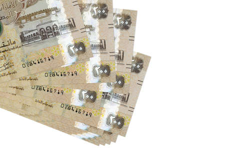 200 UAE dirhams bills lies in small bunch or pack isolated on white. Mockup with copy space....