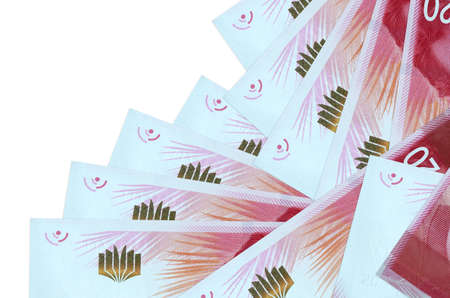 20 Israeli new shekels bills lies in different order isolated on white. Local banking or money...