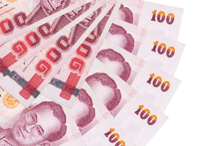 100 Thai Baht bills lies isolated on white background with copy space stacked in fan shape close up....