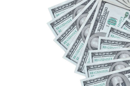100 US dollars bills lies isolated on white background with copy space. Rich life conceptual...