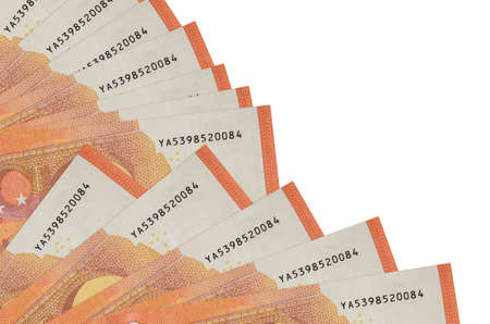 10 euro bills lies isolated on white background with copy space stacked in fan close up. Payday time...