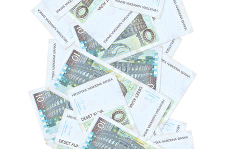 10 Croatian kuna bills flying down isolated on white. Many banknotes falling with white copy space...