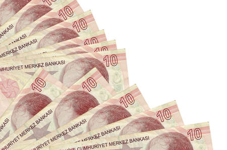 10 Turkish liras bills lies isolated on white background with copy space stacked in fan close up....