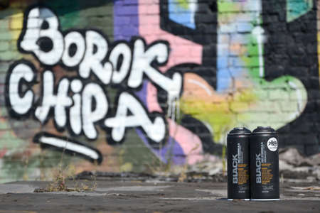 KHARKOV, UKRAINE - AUGUST 16, 2020: Used Montana black aerosol spray cans against graffiti...