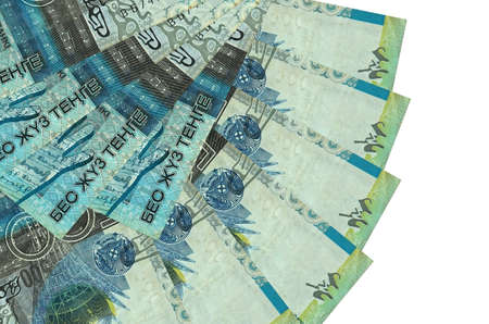 500 Kazakhstani tenge bills lies isolated on white background with copy space stacked in fan shape close up. Financial transactions conceptの写真素材