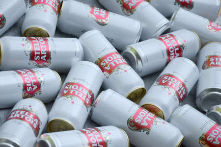 KHARKOV, UKRAINE - AUGUST 22 2020: Many tin cans of Stella Artois beer outdoors. Stella Artois is...