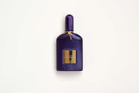 KHARKOV, UKRAINE - FEBRUARY 29, 2020: Tom Ford velvet orchid fragrance perfume bottle lies on light...