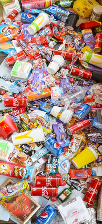 KHARKOV, UKRAINE - APRIL 8, 2020: Many wrappings and cans from used products by famous worldwide...