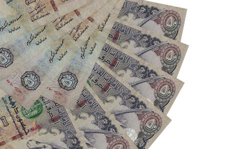 50 UAE dirhams bills lies isolated on white background with copy space stacked in fan shape close...