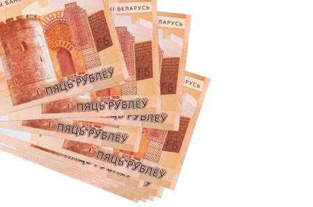 5 Belorussian rubles bills lies in small bunch or pack isolated on white. Mockup with copy space....