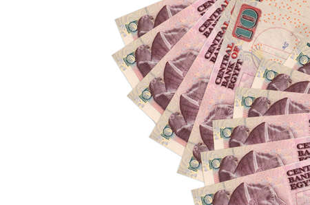 10 Egyptian pounds bills lies isolated on white background with copy space. Rich life conceptual...