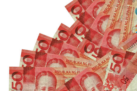 50 Philippine piso bills lies in different order isolated on white. Local banking or money making...
