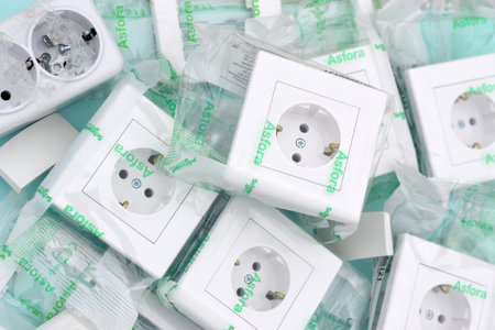 KHARKOV, UKRAINE - NOVEMBER 06, 2020: Schneider electric plastic electrical outlets with european plug standard. Schneider Electric is a European multinational company providing energyのeditorial素材