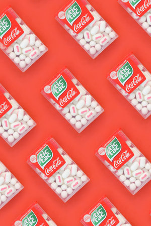 KHARKOV, UKRAINE - OCTOBER 17, 2020: Many Tic Tac Candy packages with Coca-Cola taste. Tic tac is popular due its minty fresh taste and easy to carry. Hard mints produced by Ferrero since 1968のeditorial素材
