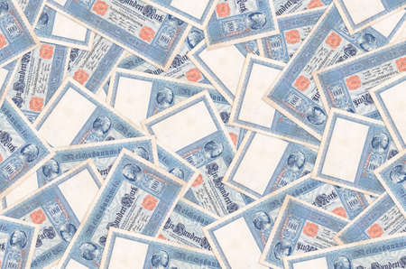 100 Reich marks bills lies in big pile. Rich life conceptual background. Big amount of money