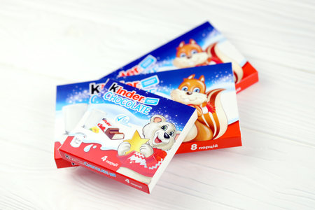 KHARKOV, UKRAINE - NOVEMBER 24, 2020: Kinder small Chocolate bars in paper wrappings made by Ferrero SpA. Kinder is a confectionery product brand line of Italian multinational manufacturer Ferreroのeditorial素材