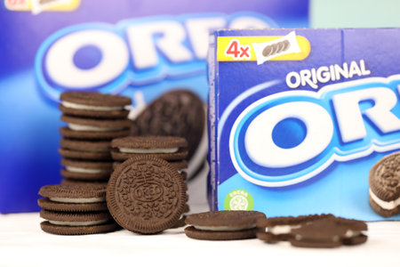 KHARKOV, UKRAINE - NOVEMBER 24, 2020: Oreo sandwich cookies and blue product boxes on white table. Oreo is a sandwich cookie with a sweet cream is the best selling cookie in the USのeditorial素材